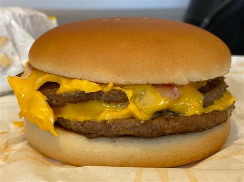 How much is a mcdonald%27s cheeseburger - There are 300 calories in a McDonald’s Cheeseburger. Order one today from the full menu in the app using contactless Mobile Order & Pay for pickup or McDelivery ® and earn points on every order with MyMcDonald's Rewards to redeem for a free Cheeseburger.^ *National sandwiches only. Excludes local and limited time options.